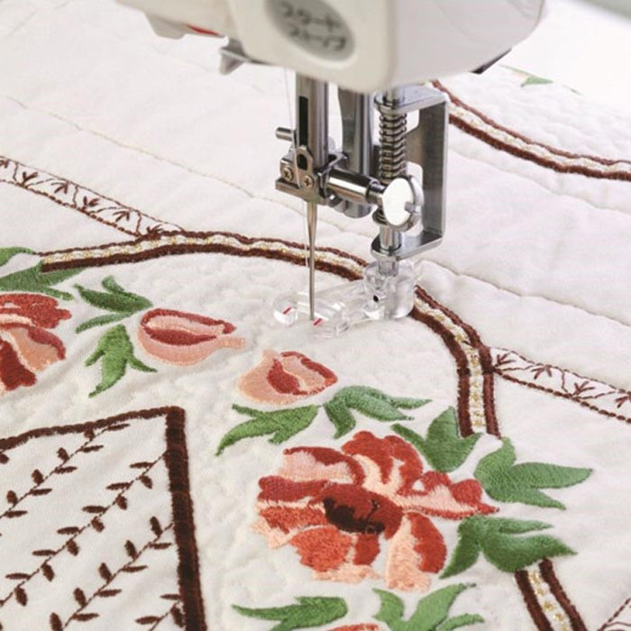 Pied pour quilt, matelassage ouvert Janome / Elna Pied pour quilt, matelassage ouvert Janome / Elna