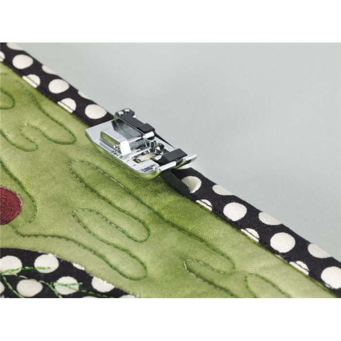 Pied surpiqûre, bordures étroites long Pied surpiqûre, bordures étroites long